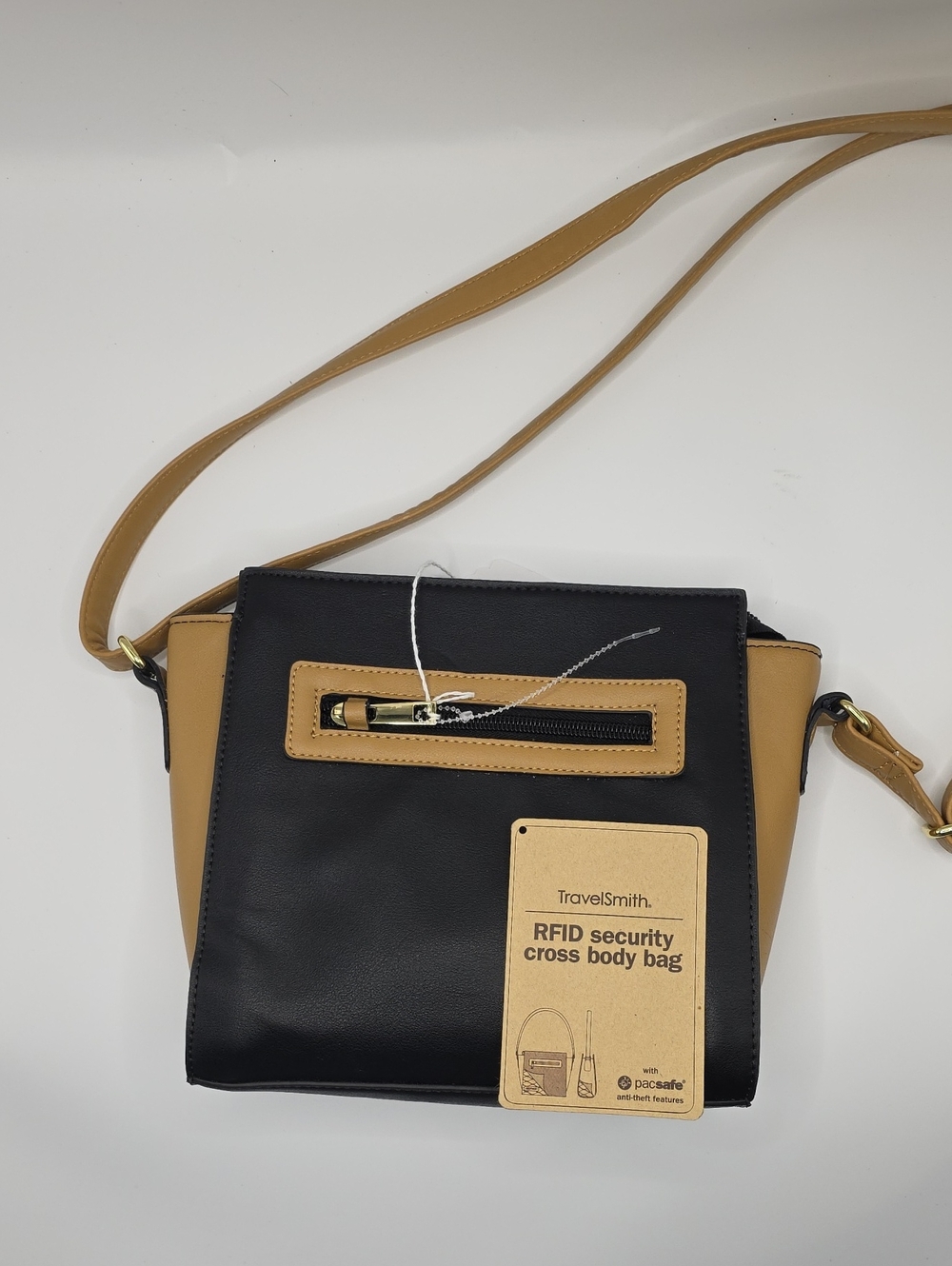 TravelSmith Black and Tan RFID Crossbody with Front Zip Accent